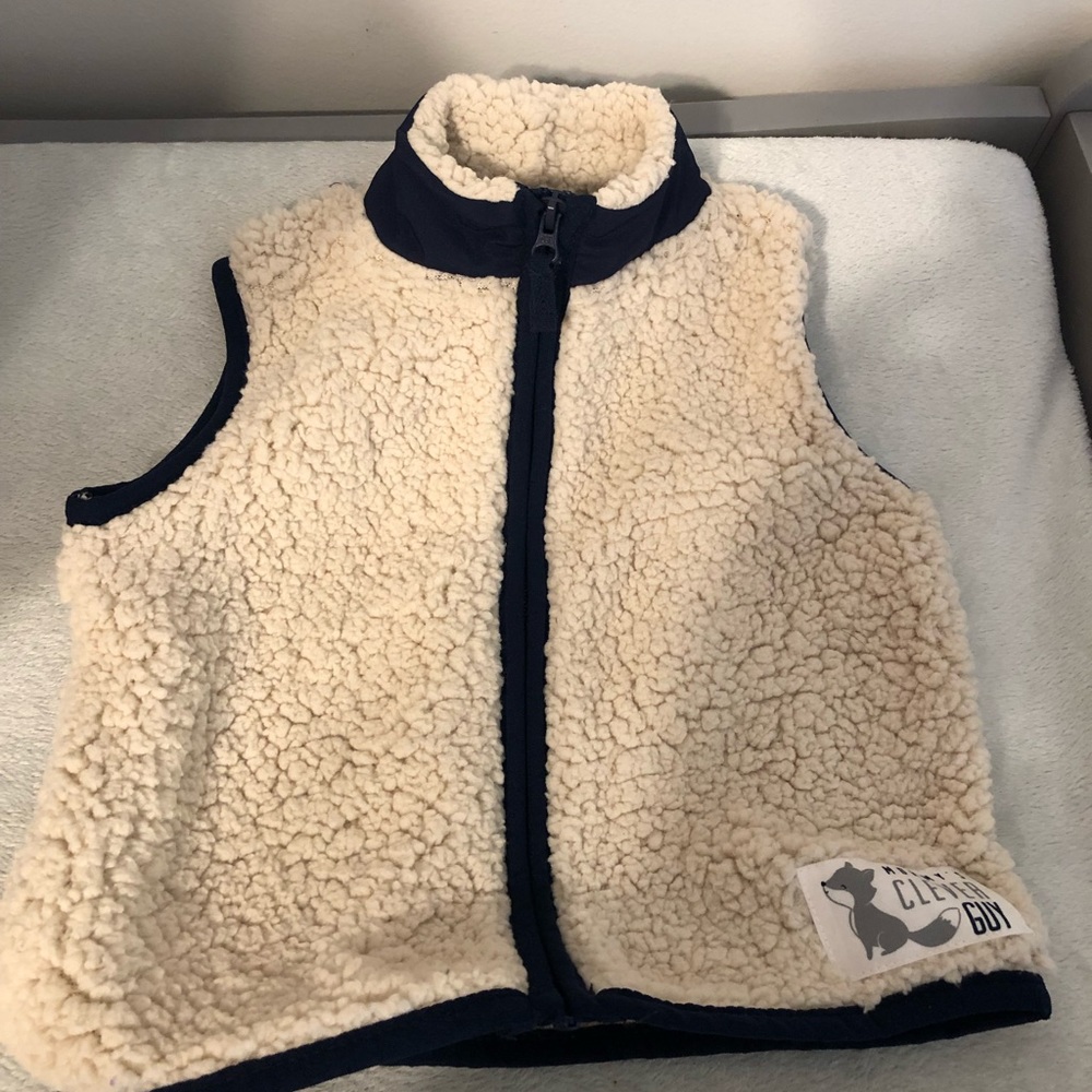 Two soft zip up vests